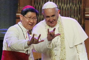 3-fingered gesture of the Pope